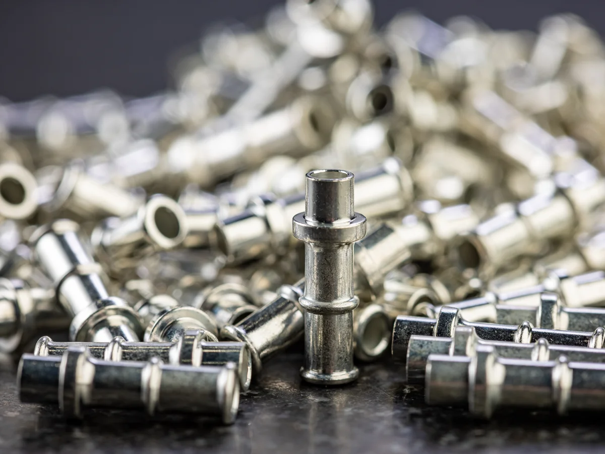 Silver-plated brass precision turned components produced by Metal Essence